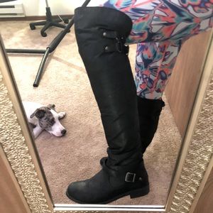 Over the knee black boots